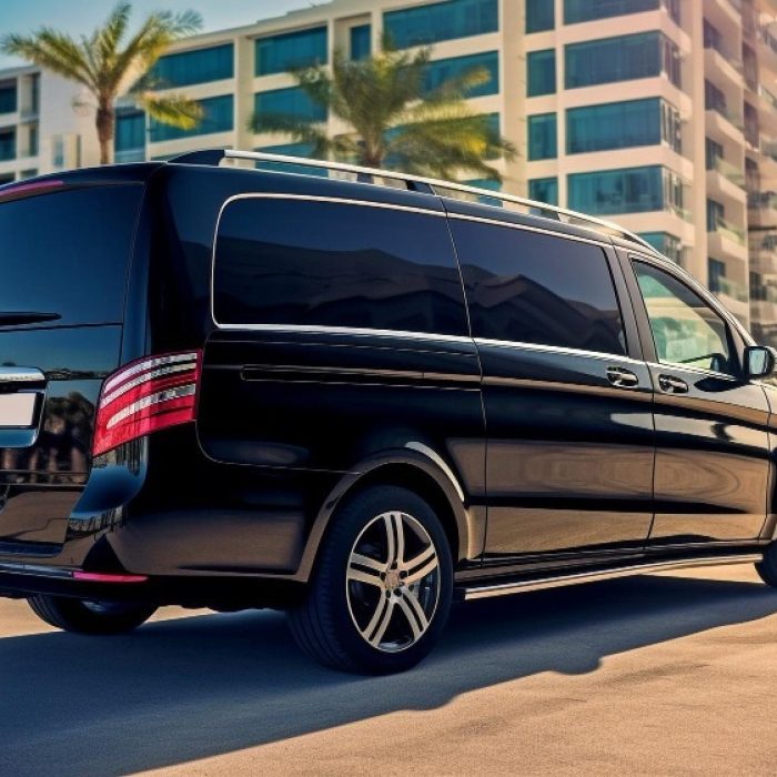 generative-ai-rear-view-black-executive-luxury-vehicle-parked-metropolis